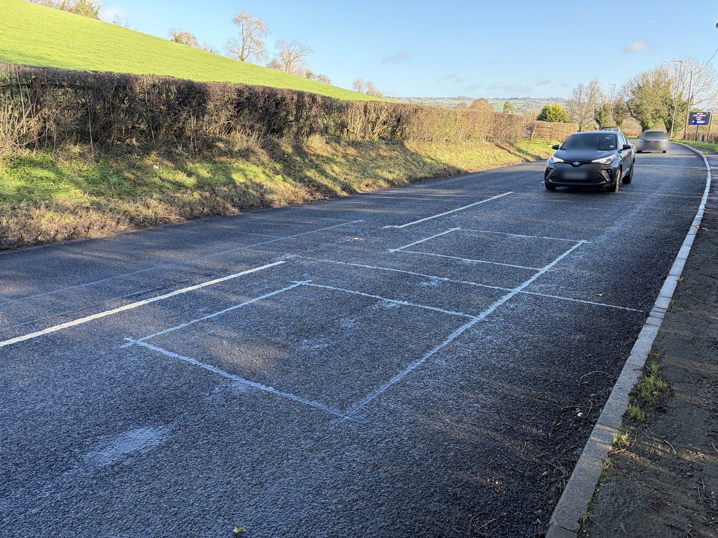 Completed loop installation marked out on a rural road